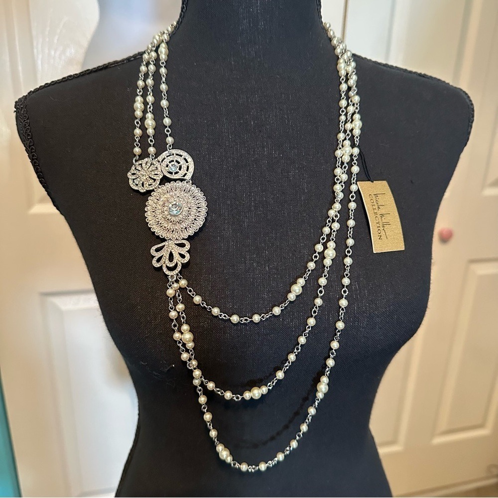 Nicole Miller Elegant Silver and Cream Beaded Necklace and silver Pendant